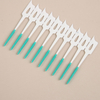 Silicone mint-flavored interdental toothbrush for cleaning tooth gaps and massaging teeth. 40-piece box.