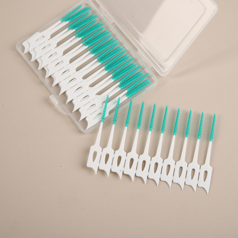Silicone mint-flavored interdental toothbrush for cleaning tooth gaps and massaging teeth. 40-piece box.